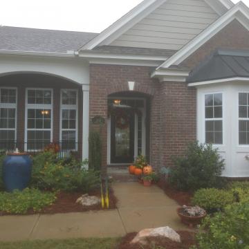 residential exterior window tinting brick house